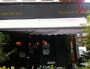 The Greedy Buddha outside