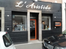 L Aristide outside