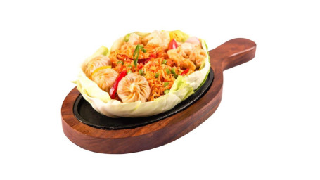 Chicken Dimsum With Schezwan Rice Sizzlers