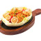 Chicken Dimsum With Schezwan Rice Sizzlers