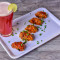 Chicken Schezwan Momos Jathi Fruit Mocktail Combo